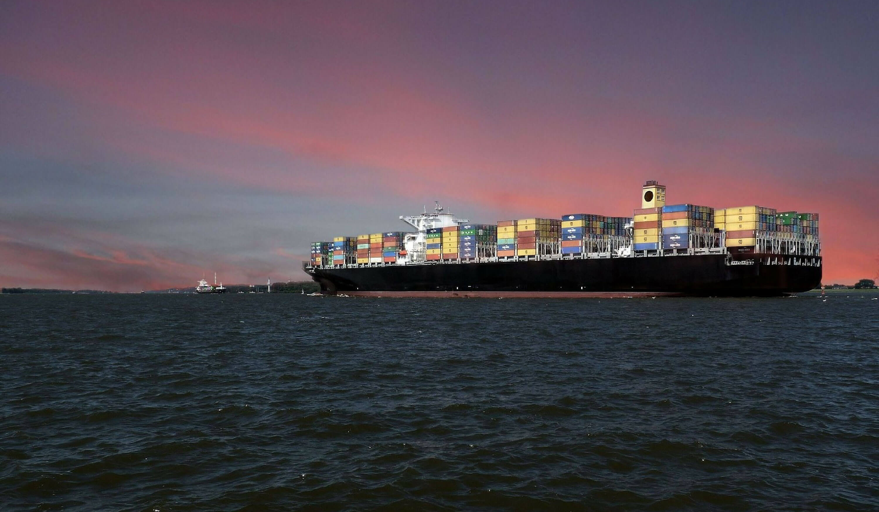 What is the purpose of a container ship in the supply chain